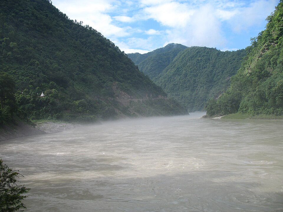 Misty river in valley